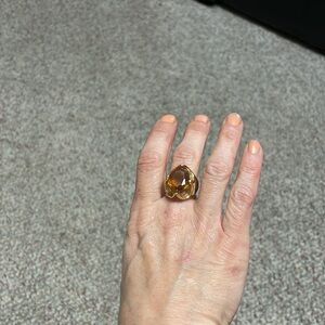 Elegant Gold-Toned Ring with Amber Stone